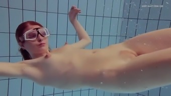 naughty funny redhead teen (18+) pool solo bikini