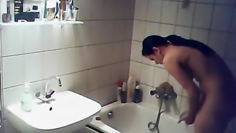 spy shower bath bathroom brunette clothed cute